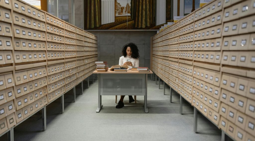 Lady in between two long cabinets
